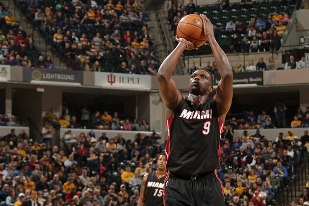 INDIANAPOLIS, IN - DECEMBER 31:  Luol Deng #9 of the Miami Heat shoots a free throw against the Indiana Pacers during the game on December 31, 2014 at Bankers Life Fieldhouse in Indianapolis, Indiana. NOTE TO USER: User expressly acknowledges and agrees that, by downloading and or using this Photograph, user is consenting to the terms and conditions of the Getty Images License Agreement. Mandatory Copyright Notice: Copyright 2014 NBAE (Photo by Ron Hoskins/NBAE via Getty Images)