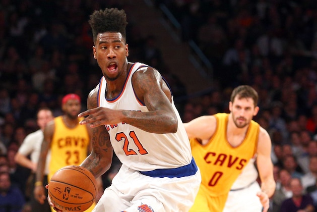 Dec 4, 2014; New York, NY, USA; New York Knicks shooting guard Iman Shumpert (21) controls the ball against the Cleveland Cavaliers at Madison Square Garden. The Cavaliers defeated the Knicks 90-87. Mandatory Credit: Brad Penner-USA TODAY Sports