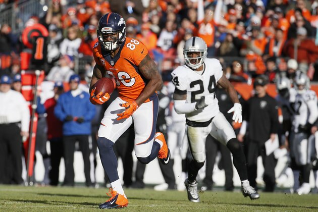 Denver Broncos wide receiver Demaryius Thomas (88) runs agains the Oakland Raiders during the first half of an NFL football game, Sunday, Dec. 28, 2014, in Denver. (AP Photo/Jack Dempsey)