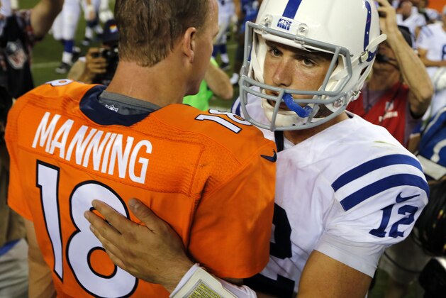 Denver Broncos quarterback Peyton Manning (18) greets Indianapolis Colts quarterback Andrew Luck (12) after an NFL football game, Sunday, Sept. 7, 2014, in Denver. The Broncos won 31-24. (AP Photo/Jack Dempsey) Denver Broncos quarterback Peyton Manning (18) greets Indianapolis Colts quarterback Andrew Luck (12) after an NFL football game, Sunday, Sept. 7, 2014, in Denver. The Broncos won 31-24. (AP Photo/Jack Dempsey)