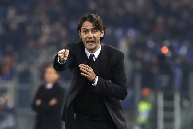 AC Milan coach Filippo Inzaghi shouts instructions to his players during an Italian Serie A soccer match between Roma and AC Milan at Rome's Olympic stadium, Saturday, Dec. 20, 2014. (AP Photo/Alessandra Tarantino)