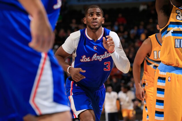 DENVER, CO - DECEMBER 19:  Chris Paul #3 of the Los Angeles Clippers takes the court against the Denver Nuggets at Pepsi Center on December 19, 2014 in Denver, Colorado. The Nuggets defeated the Clippers 109-106. NOTE TO USER: User expressly acknowledges and agrees that, by downloading and or using this photograph, User is consenting to the terms and conditions of the Getty Images License Agreement.  (Photo by Doug Pensinger/Getty Images)