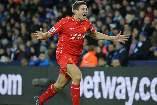 Liverpool's Steven Gerrard celebrates after scoring against Leicester during the English Premier League soccer match between Leicester City and Liverpool at King Power Stadium, in Leicester, England, Tuesday, Dec. 2, 2014.  (AP Photo/Rui Vieira)