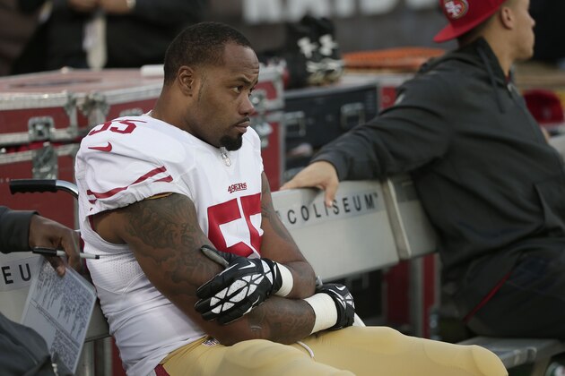 San Francisco 49ers linebacker Ahmad Brooks (55) sits on the bench during the fourth quarter of an NFL football game against the Oakland Raiders in Oakland, Calif., Sunday, Dec. 7, 2014. The Raiders won 24-13. (AP Photo/Marcio Jose Sanchez)