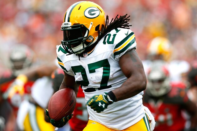 TAMPA, FL - DECEMBER 21:  Eddie Lacy #27 of the Green Bay Packers rushes for a touchdown against the Tampa Bay Buccaneers at Raymond James Stadium on December 21, 2014 in Tampa, Florida.  (Photo by Kevin C. Cox/Getty Images)