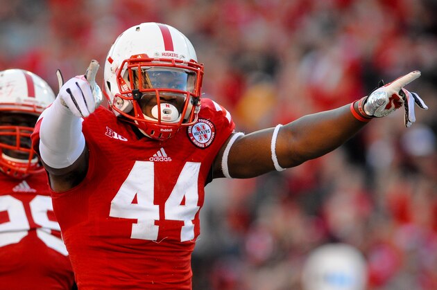 LINCOLN, NE - NOVEMBER 16: Defensive end Randy Gregory #44 of the Nebraska Cornhuskers reacts after a tackle during their game at against the Michigan State Spartans Memorial Stadium on November 16, 2013 in Lincoln, Nebraska. (Photo by Eric Francis/Getty Images)