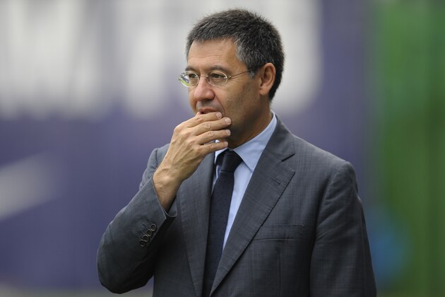 FC Barcelona's president Josep Maria Bartomeu gestures prior to a training session at the Sports Center FC Barcelona Joan Gamper in San Joan Despi, Spain, Friday, July 25, 2014. (AP Photo/Manu Fernandez)