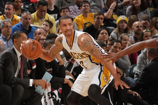 INDIANAPOLIS, IN - DECEMBER 31:  George Hill #3 of the Indiana Pacers handles the ball against the Miami Heat during the game on December 31, 2014 at Bankers Life Fieldhouse in Indianapolis, Indiana. NOTE TO USER: User expressly acknowledges and agrees that, by downloading and or using this Photograph, user is consenting to the terms and conditions of the Getty Images License Agreement. Mandatory Copyright Notice: Copyright 2014 NBAE (Photo by Ron Hoskins/NBAE via Getty Images)