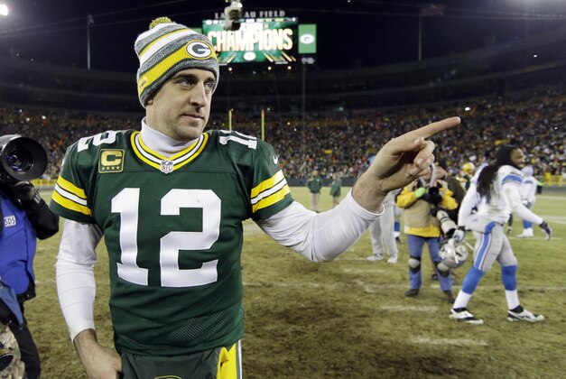 Green Bay Packers' Aaron Rodgers walks off the field after an NFL football game against the Detroit Lions Sunday, Dec. 28, 2014, in Green Bay, Wis. The Packers won 30-20. (AP Photo/Tom Lynn)