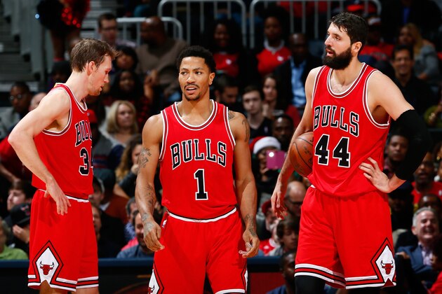 ATLANTA, GA - DECEMBER 15:  Mike Dunleavy #34, Derrick Rose #1 and Nikola Mirotic #44 of the Chicago Bulls react after a foul during the game against the Atlanta Hawks at Philips Arena on December 15, 2014 in Atlanta, Georgia.  NOTE TO USER: User expressly acknowledges and agrees that, by downloading and or using this photograph, User is consenting to the terms and conditions of the Getty Images License Agreement.  (Photo by Kevin C. Cox/Getty Images)