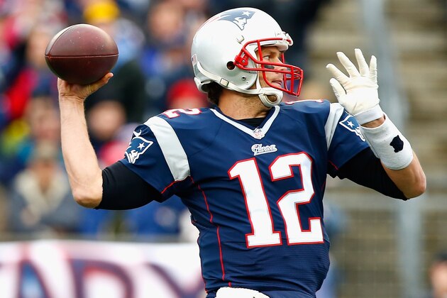 FOXBORO, MA - DECEMBER 28:  Tom Brady #12 of the New England Patriots passes the ball during the first quarter against the Buffalo Bills at Gillette Stadium on December 28, 2014 in Foxboro, Massachusetts.  (Photo by Jared Wickerham/Getty Images)