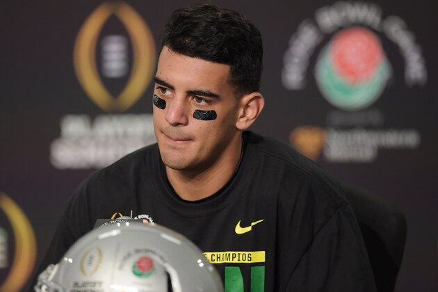 Jan 1, 2015; Pasadena, CA, USA; Oregon Ducks quarterback Marcus Mariota (8) during the post-game press conference after the 2015 Rose Bowl college football game at Rose Bowl. Oregon Ducks defeated Florida State Seminoles 59-20. Mandatory Credit: Kirby Lee-USA TODAY Sports