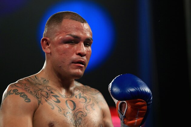 BROOMFIELD, CO - OCTOBER 19:  Mike Alvarado heads to his corner as he was defeated by Ruslan Provodnikov of Russia with a TKO in the 10th round to claim the WBO Junior Welterweight Title at the 1stBank Center on October 19, 2013 in Broomfield, Colorado.  (Photo by Doug Pensinger/Getty Images)