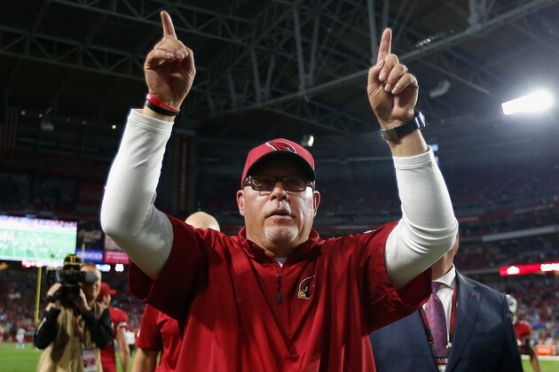 GLENDALE, AZ - NOVEMBER 16:  Head coach Bruce Arians of the Arizona Cardinals celebrates as he walks off the fiield after defeating the Detroit Lions 14-6 following the NFL game at the University of Phoenix Stadium on November 16, 2014 in Glendale, Arizona.  (Photo by Christian Petersen/Getty Images)
