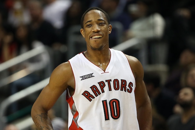 Nov 21, 2014; Toronto, Ontario, CAN; Toronto Raptors guard DeMar DeRozan (10) smiles during their victory against the Milwaukee Bucks at Air Canada Centre. The Raptors beat the Bucks 124-83. Mandatory Credit: Tom Szczerbowski-USA TODAY Sports