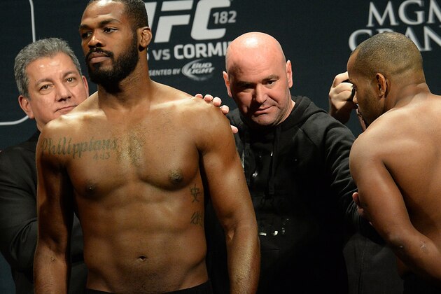 Jan 2, 2015; Las Vegas, NV, USA;   UFC President Dana White separates Jon Jones and Daniel Cormier during the weigh in for their Light Heavyweight Title Bout at MGM Grand Garden Arena. Mandatory Credit: Jayne Kamin-Oncea-USA TODAY Sports