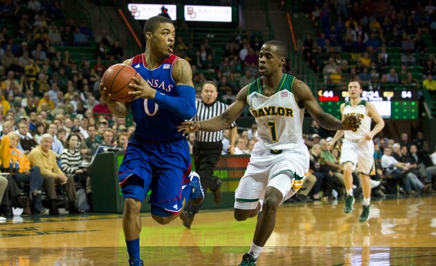 Jan 7, 2015; Waco, TX, USA; Baylor Bears forward Royce O'Neale (00) celebrates a made 3-point basket against the Kansas Jayhawks during the first half at Ferrell Center. Mandatory Credit: Ray Carlin-USA TODAY Sports