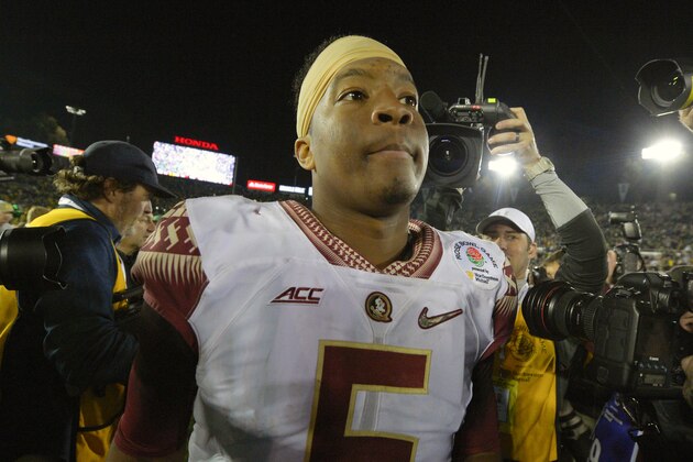 Florida State quarterback Jameis Winston walks off the field after their loss to Oregon during the Rose Bowl NCAA college football playoff semifinal, Thursday, Jan. 1, 2015, in Pasadena, Calif. (AP Photo/Mark J. Terrill)