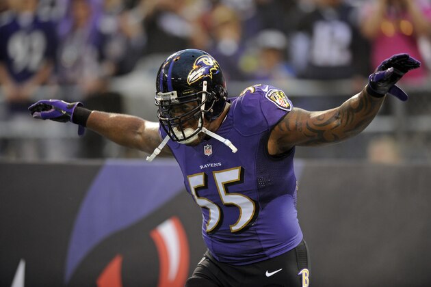 Baltimore Ravens outside linebacker Terrell Suggs runs onto the field as he is introduced before an NFL football game against the New England Patriots, Sunday, Dec. 22, 2013, in Baltimore. (AP Photo/Nick Wass)