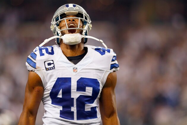 ARLINGTON, TX - JANUARY 04:  Strong safety Barry Church #42 of the Dallas Cowboys celebrates after the Cowboys defense forced quarterback Matthew Stafford #9 of the Detroit Lions to fumble the ball late in the fourth quarter during a NFC Wild Card Playoff game at AT&T Stadium on January 4, 2015 in Arlington, Texas.  (Photo by Tom Pennington/Getty Images)