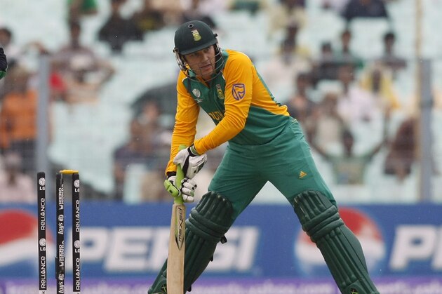 South Africa's Morne van Wyk, right, looks on after he was bowled during a Cricket World Cup match between South Africa and Ireland in Calcutta, India, Tuesday, March 15, 2011. Ireland's wicket keeper Niall O'Brien is in left. (AP Photo/Gemunu Amarasinghe)