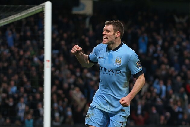 MANCHESTER, ENGLAND - JANUARY 04:  James Milner of Manchester City celebrates after scoring a goal to level the scores at 1-1 during the FA Cup Third Round match between  Manchester City and Sheffield Wednesday at Etihad Stadium on January 4, 2015 in Manchester, England.  (Photo by Jan Kruger/Getty Images)