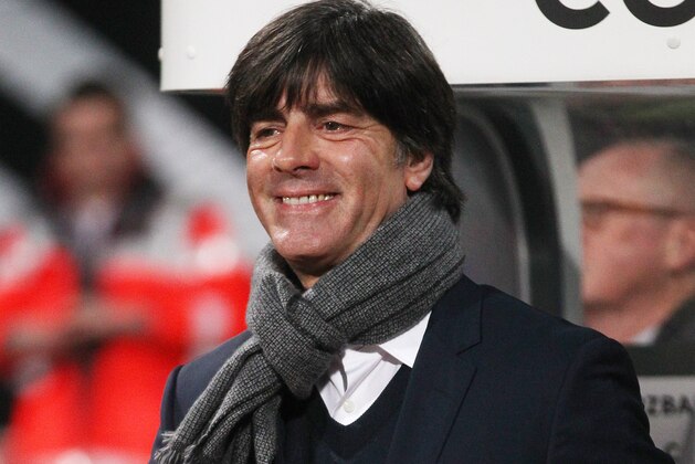 Germany's coach Joachim Loew smiles prior to a Group D Euro 2016 qualifying match between Germany and Gibraltar in Nuremberg, Germany, Friday, Nov. 14, 2014. (AP Photo/Michael Probst)
