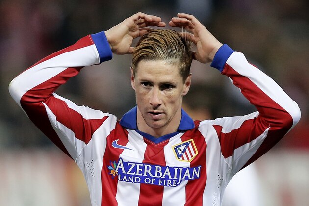 Atletico's Fernando Torres reacts during a King's Cup soccer match between Atletico de Madrid and Real Madrid at the Vicente Calderon stadium in Madrid, Spain, Wednesday, Jan. 7, 2015 . (AP Photo/Daniel Ochoa de Olza)
