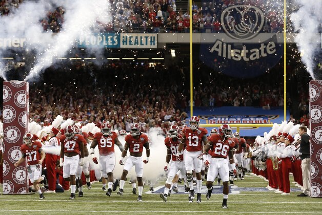 Jan 1, 2015; New Orleans, LA, USA; Alabama Crimson Tide team takes the field in the 2015 Sugar Bowl against the Ohio State Buckeyes at Mercedes-Benz Superdome. Mandatory Credit: Matthew Emmons-USA TODAY Sports