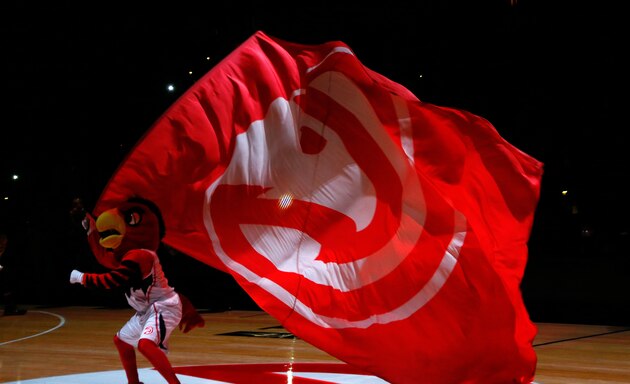 ATLANTA, GA - JANUARY 07:  Harry the Hawk waves a flag during pregame introductions prior to the game between the Atlanta Hawks and the Memphis Grizzlies at Philips Arena on January 7, 2015 in Atlanta, Georgia.  NOTE TO USER: User expressly acknowledges and agrees that, by downloading and or using this photograph, User is consenting to the terms and conditions of the Getty Images License Agreement.  (Photo by Kevin C. Cox/Getty Images)