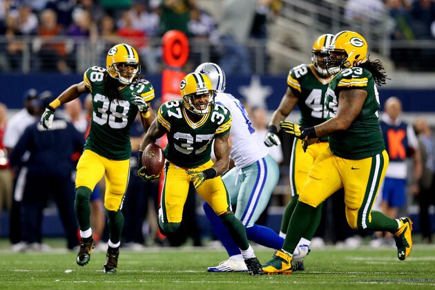 ARLINGTON, TX - DECEMBER 15: Cornerback Sam Shields #37 of the Green Bay Packers celebrates a fourth quarter interception against the Dallas Cowboys during a game at AT&T Stadium on December 15, 2013 in Arlington, Texas.  (Photo by Ronald Martinez/Getty Images)