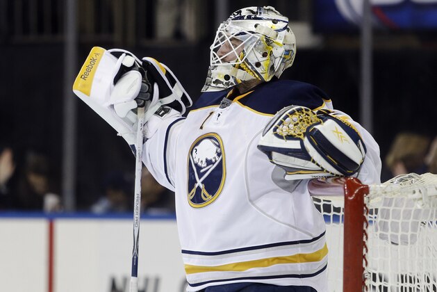 Buffalo Sabres goalie Jhonas Enroth (1) reacts after a review ruled that New York Rangers' Jesper Fast scored during the second period of an NHL hockey game Saturday, Jan. 3, 2015, in New York. (AP Photo/Frank Franklin II)