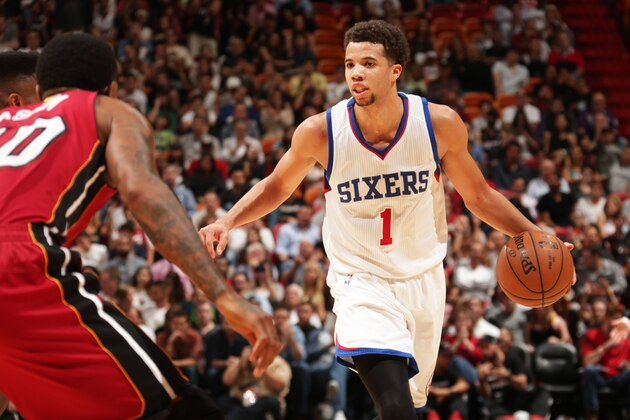 MIAMI, FL - December 23:  Michael Carter-Williams #1 of the Philadelphia 76ers handles the ball against the Miami Heat on December 23, 2014 at American Airlines Arena in Miami, Florida. NOTE TO USER: User expressly acknowledges and agrees that, by downloading and or using this Photograph, user is consenting to the terms and conditions of the Getty Images License Agreement. Mandatory Copyright Notice: Copyright 2014 NBAE (Photo by Isaac Baldizon/NBAE via Getty Images)