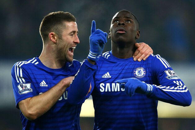 LONDON, ENGLAND - JANUARY 04:  Kurt Zouma of Chelsea (R) celebrates with Gary Cahill (L) as he scores their third goal during the FA Cup Third Round match between Chelsea and Watford at Stamford Bridge on January 4, 2015 in London, England.  (Photo by Richard Heathcote/Getty Images)