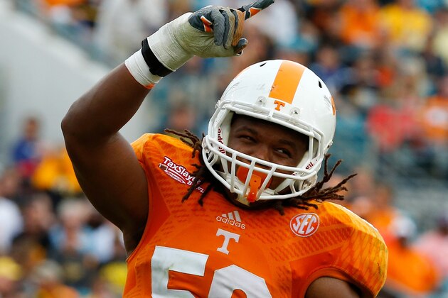 JACKSONVILLE, FL - JANUARY 02:  Curt Maggitt #56 of the Tennessee Volunteers celebrates a defensive stop during the TaxSlayer Bowl against the Iowa Hawkeyes at EverBank Field on January 2, 2015 in Jacksonville, Florida.  (Photo by Sam Greenwood/Getty Images)