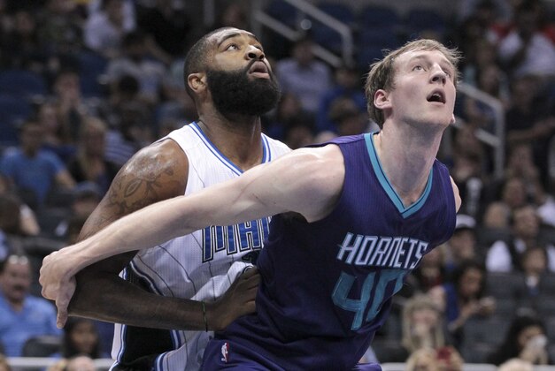 Jan 3, 2015; Orlando, FL, USA; Charlotte Hornets center Cody Zeller (40) and Orlando Magic forward Kyle O'Quinn fight for position during the third quarter of an NBA basketball game at Amway Center. Mandatory Credit: Reinhold Matay-USA TODAY Sports