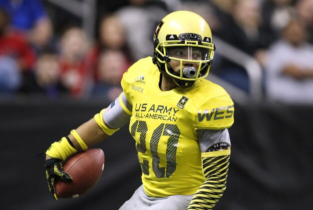 Jan 3, 2015; San Antonio, TX, USA; West running back Derrius Guice (20) scores a touchdown against the East during the U.S. Army All-American Bowl at the Alamodome. Guice was the game offensive MVP. West beat East 39-36. Mandatory Credit: Erich Schlegel-USA TODAY Sports