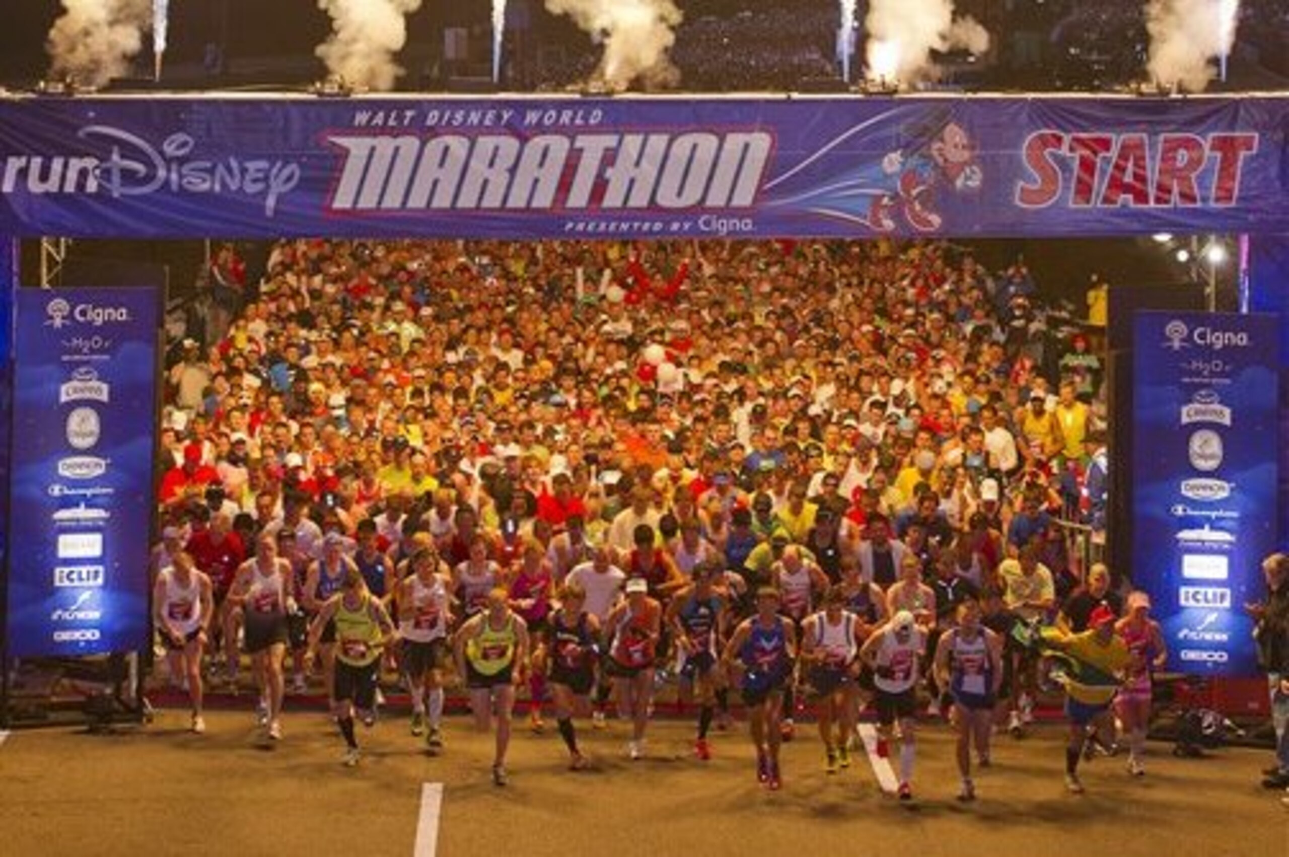 In this photo provided by Disney, runners start the 19th annual Walt Disney World Marathon at 5:35 a.m., Sunday, Jan. 8, 2012, at Walt Disney World Resort in Lake Buena Vista, Fla. The 26.2-mile race, with a field of 26,500 registered runners from all 50 U.S. states and more than 60 international countries, takes athletes through all four Walt Disney World theme parks and several Disney resort hotel areas. (AP Photo/Disney, Matt Stroshane)