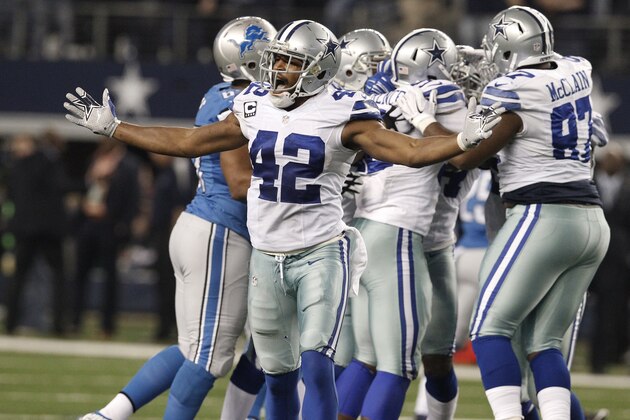 Dallas Cowboys strong safety Barry Church (42) celebrates after defensive end Demarcus Lawrence sacked Detroit Lions quarterback Matthew Stafford (9) to cause a fumble during the second half of an NFL wildcard playoff football game, Sunday, Jan. 4, 2015, in Arlington, Texas. The Cowboys won 24-20. (AP Photo/Brandon Wade)