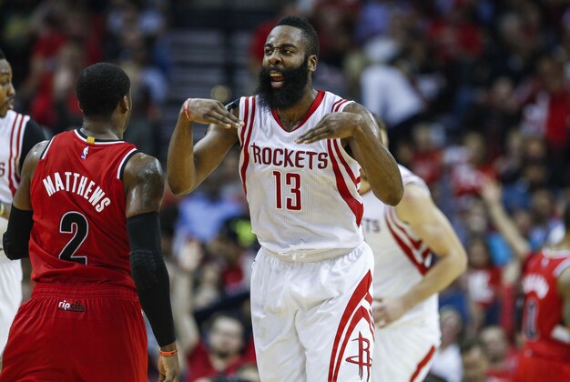 Dec 22, 2014; Houston, TX, USA; Houston Rockets guard James Harden (13) reacts after making a basket during the fourth quarter against the Portland Trail Blazers at Toyota Center. The Rockets defeated the Trail Blazers 110-95. Mandatory Credit: Troy Taormina-USA TODAY Sports