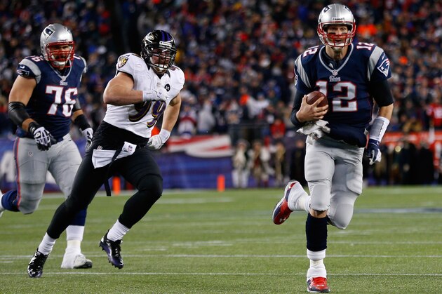 FOXBORO, MA - JANUARY 20:  Tom Brady #12 of the New England Patriots runs the ball against the Baltimore Ravens during the 2013 AFC Championship game at Gillette Stadium on January 20, 2013 in Foxboro, Massachusetts.  (Photo by Jim Rogash/Getty Images)