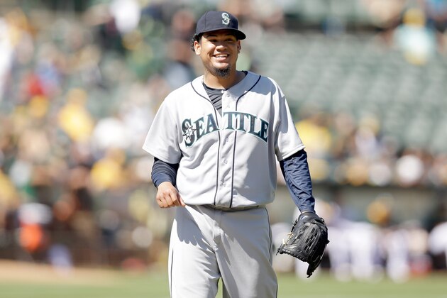 OAKLAND, CA - SEPTEMBER 03:  Felix Hernandez #34 of the Seattle Mariners smiles as he walks off the field after the eighth inning of their game against the Oakland Athletics at O.co Coliseum on September 3, 2014 in Oakland, California.  (Photo by Ezra Shaw/Getty Images)