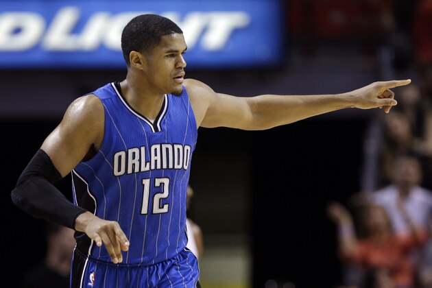 Orlando Magic forward Tobias Harris (12) reacts after shooting a 3-point shot during the second half of an NBA basketball game against the Miami Heat, Monday, Dec. 29, 2014, in Miami. The Magic defeated the Heat 102-101. (AP Photo/Lynne Sladky)