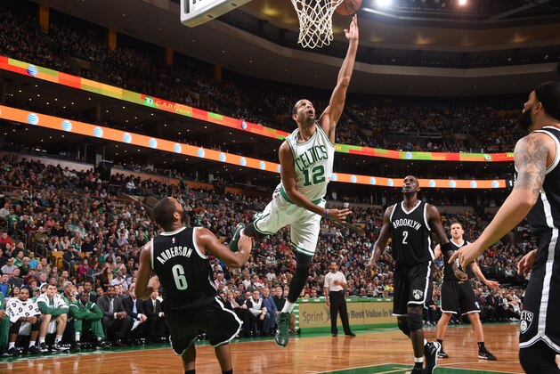 BOSTON, MA - DECEMBER 26:  Brandan Wright #12 of the Boston Celtics shoots the ball against the Brooklyn Nets during the game on December 26, 2014 at the TD Garden in Boston, Massachusetts. NOTE TO USER: User expressly acknowledges and agrees that, by downloading and or using this Photograph, user is consenting to the terms and conditions of the Getty Images License Agreement. Mandatory Copyright Notice: Copyright 2014 NBAE (Photo by Brian Babineau /NBAE via Getty Images)