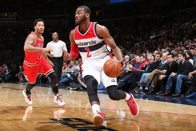 WASHINGTON, DC -  JANUARY 9:  John Wall #2 of the Washington Wizards handles the ball against the Chicago Bulls during the game on January 9, 2015 at Verizon Center in Washington, DC. NOTE TO USER: User expressly acknowledges and agrees that, by downloading and or using this Photograph, user is consenting to the terms and conditions of the Getty Images License Agreement. Mandatory Copyright Notice: Copyright 2015 NBAE (Photo by Ned Dishman/NBAE via Getty Images)