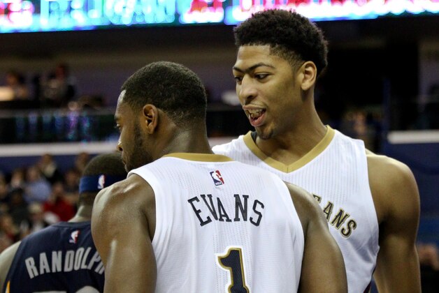 Jan 9, 2015; New Orleans, LA, USA; New Orleans Pelicans forward Anthony Davis (23) celebrates with guard Tyreke Evans (1) after a basket against the Memphis Grizzlies during the second quarter of a game at the Smoothie King Center. Mandatory Credit: Derick E. Hingle-USA TODAY Sports