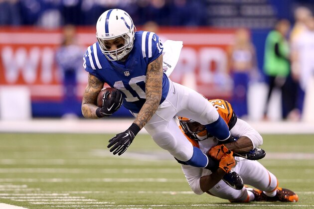 INDIANAPOLIS, IN - JANUARY 04:  Donte Moncrief #10 of the Indianapolis Colts is tackled by Terence Newman #23 of the Cincinnati Bengals in the second half during their AFC Wild Card game at Lucas Oil Stadium on January 4, 2015 in Indianapolis, Indiana.  (Photo by Andy Lyons/Getty Images)