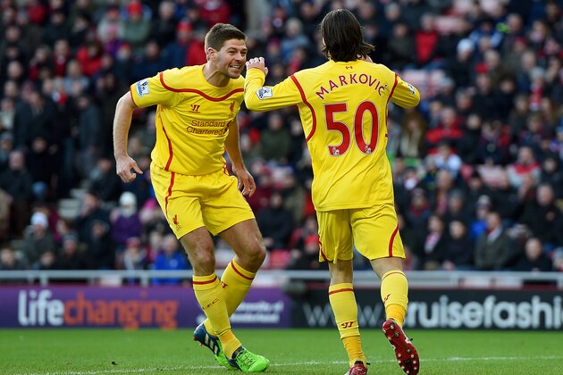 SUNDERLAND, ENGLAND - JANUARY 10:  Lazar Markovic of Liverpool celebrates scoring the opening goal with Steven Gerrard during the Barclays Premier League match between Sunderland and Liverpool at Stadium of Light on January 10, 2015 in Sunderland, England.  (Photo by Michael Regan/Getty Images)