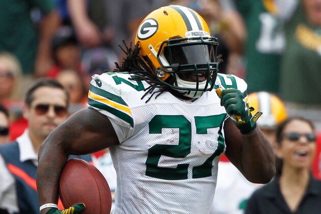 Dec 21, 2014; Tampa, FL, USA; Green Bay Packers running back Eddie Lacy (27) runs the ball in for a touchdown against the Tampa Bay Buccaneers during the first half at Raymond James Stadium. Mandatory Credit: Kim Klement-USA TODAY Sports