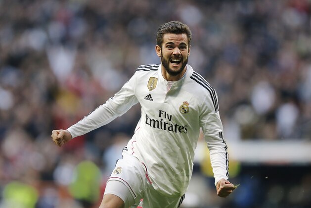 Real Madrid's Jose Ignacio Fernandez 'Nacho' celebrates his goal during a Spanish La Liga soccer match between Real Madrid and Espanyol at the Santiago Bernabeu stadium  in Madrid, Spain, Saturday, Jan. 10, 2015 . (AP Photo/Daniel Ochoa de Olza)